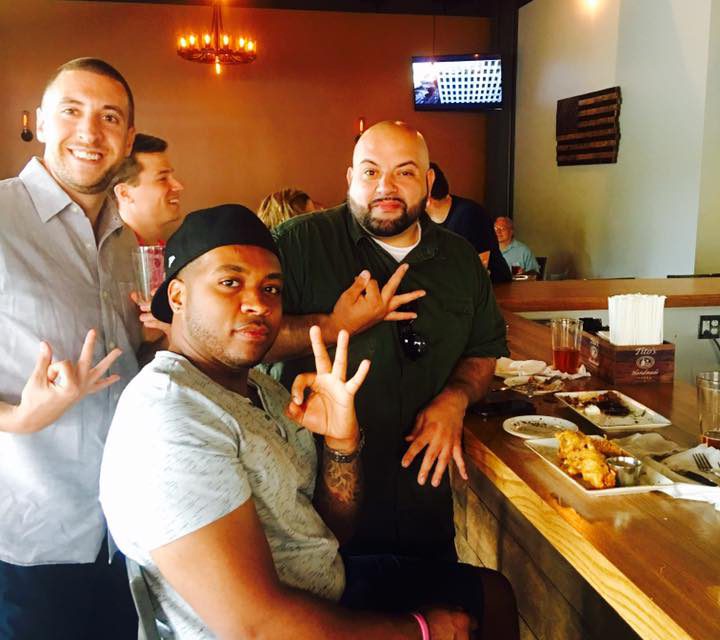 Customers sitting at bar