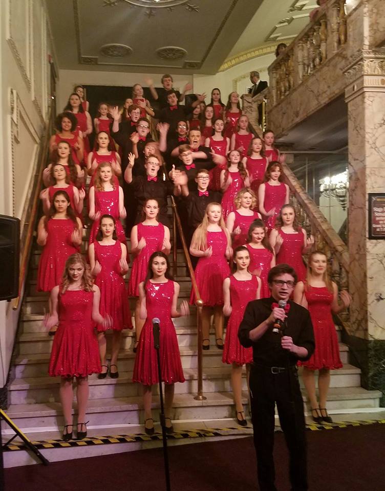 Stage Right performers on steps at Palace Theatre