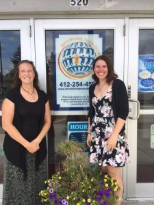 Caitlin & Diana standing in front of Brookline Teen Outreach