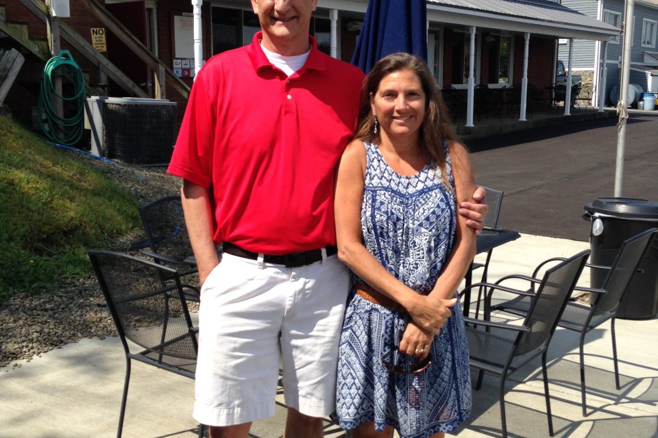 Rob and Karen Schepner standing in front of Silver Shores Restaurant