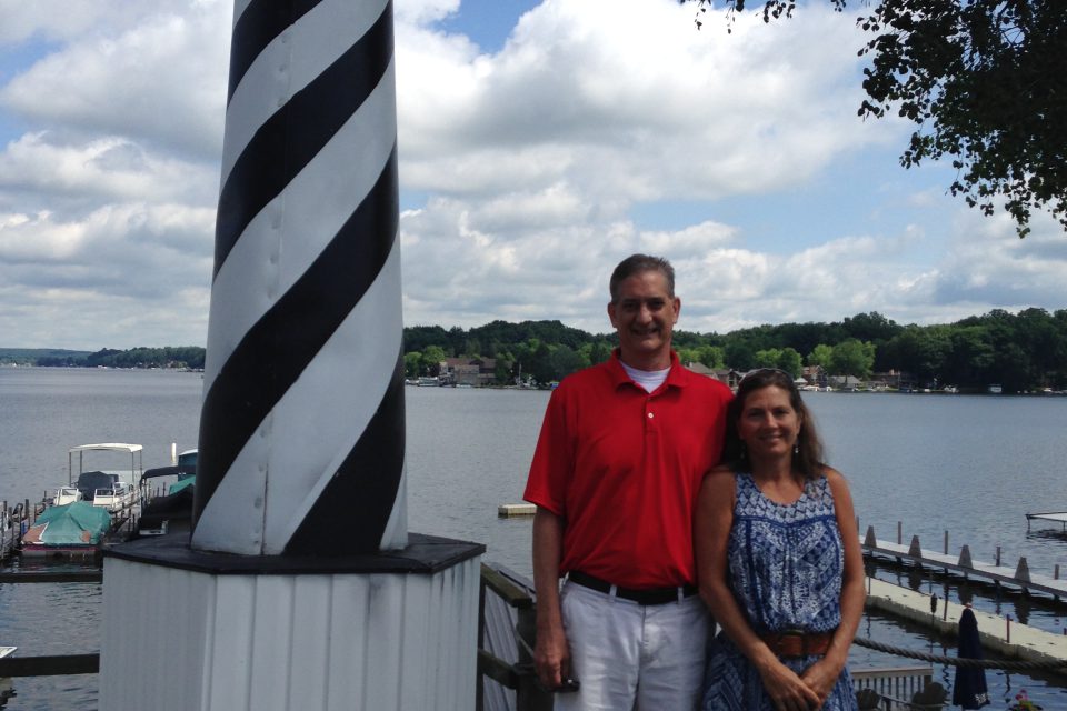 Rob and Karen Schepner standing near lighthouse