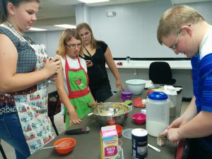 Kids working in kitchen