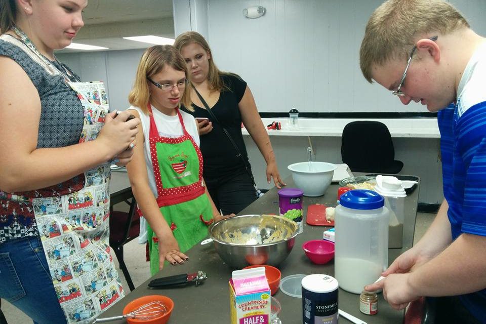 Kids working in kitchen