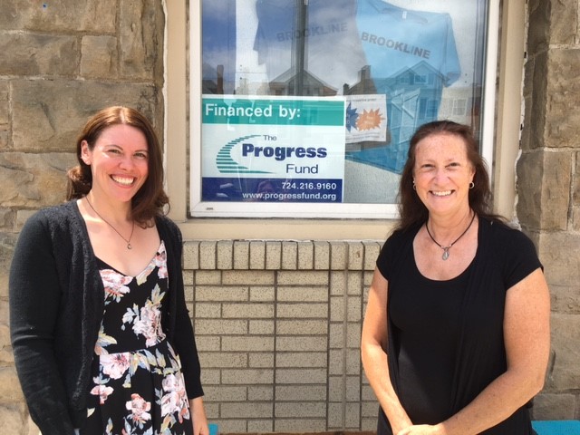 Caitlin & Diana standing in front of Brookline Teen Outreach building