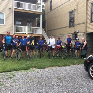 Guest cyclists standing in front of Inn on Decatur